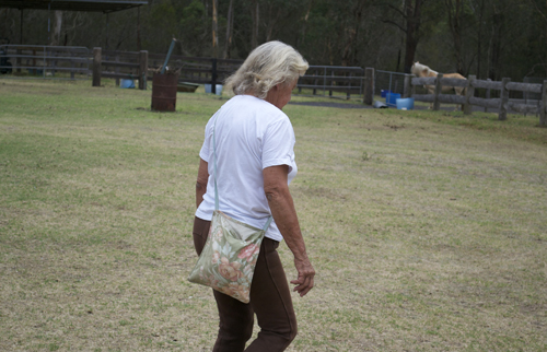 Anna walking with oatbag